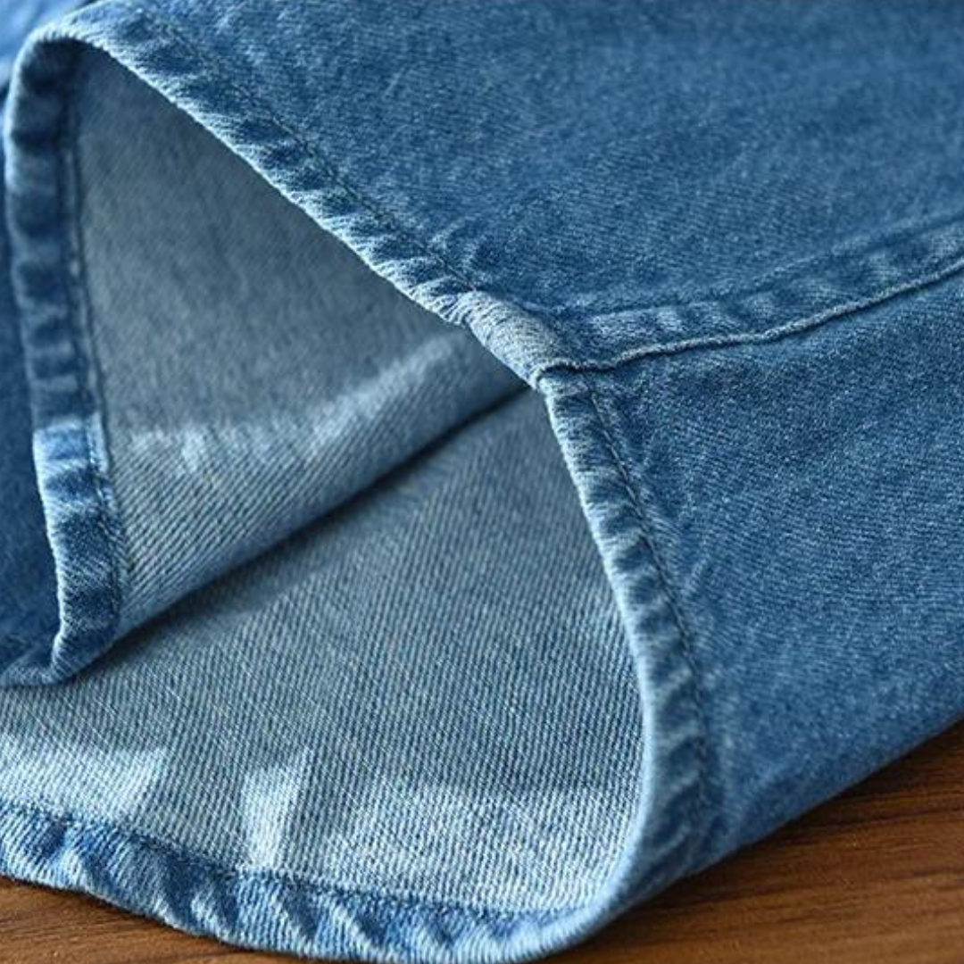 Versatile men's black casual denim shirt, a stylish long sleeve button-down for contemporary men's fashion.