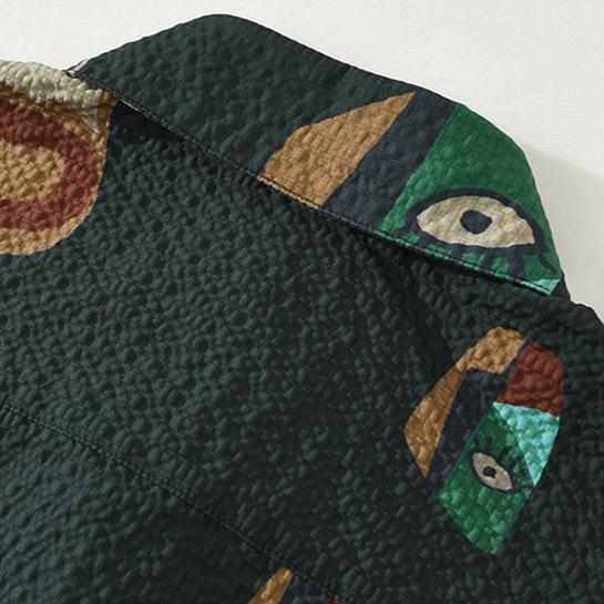 Men's casual short sleeve shirt with bold Oruka abstract tribal art. Unique cubist fashion statement piece.