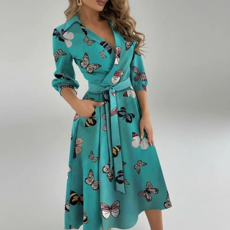 Stylish women's A-line midi dress with belt, V-neck, and 3/4 sleeves, perfect for casual or elegant looks.