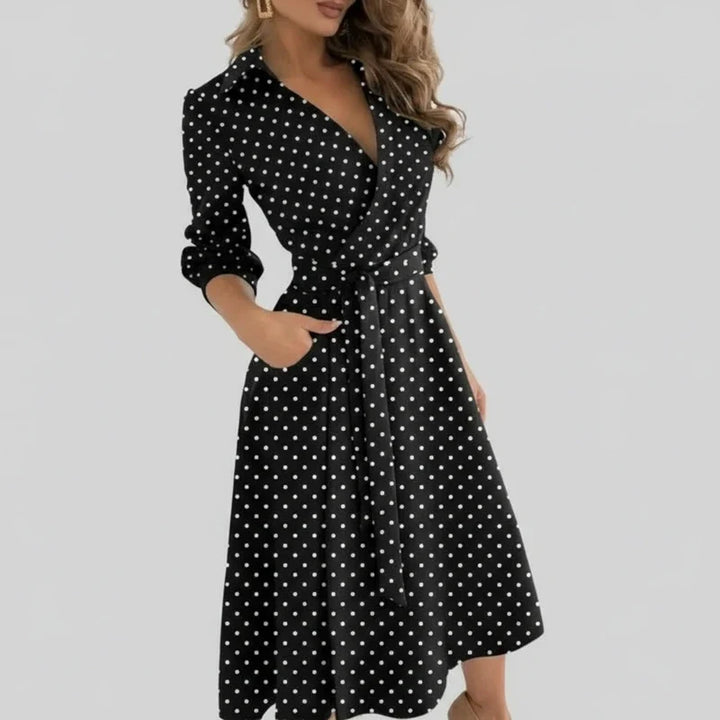 Effortlessly stylish women's midi dress. Belted A-line silhouette, V-neck, 3/4 sleeve, for ultimate comfort.