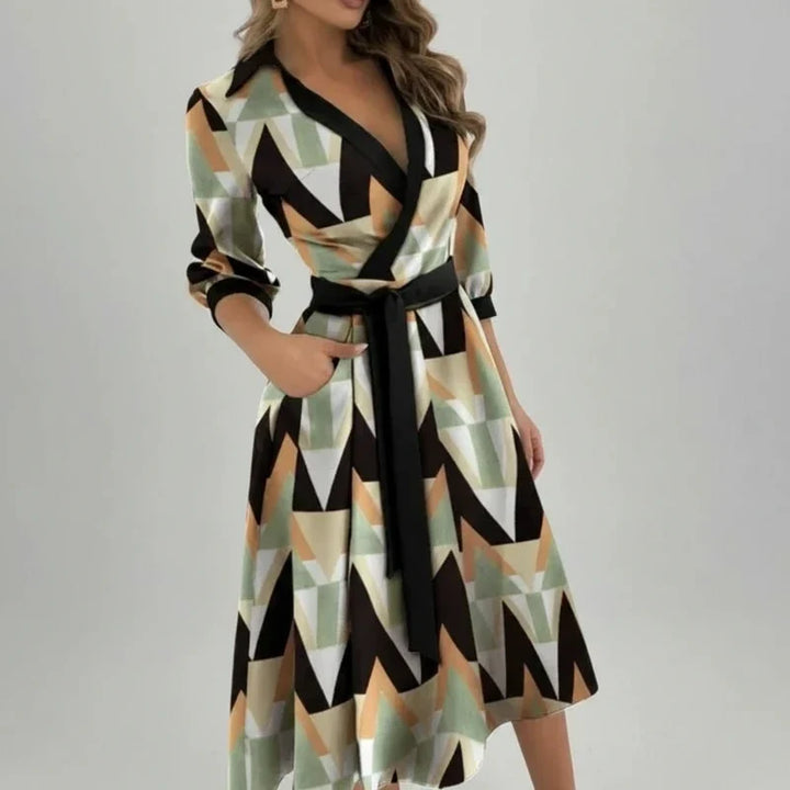 Women's flattering A-line midi dress with a stylish belt, V-neck, and practical 3/4 sleeves. Versatile comfort.
