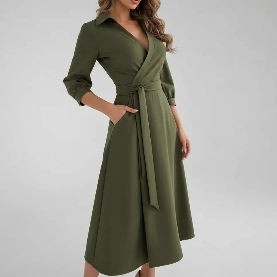 Elegant women's belted A-line midi dress. Features a V-neck, 3/4 sleeves, ideal for comfortable daily wear.