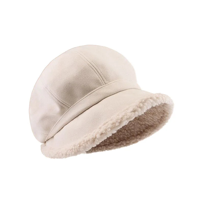 Elegant women's velvet beret hat in deep red, a chic and warm winter headwear accessory with classic appeal.