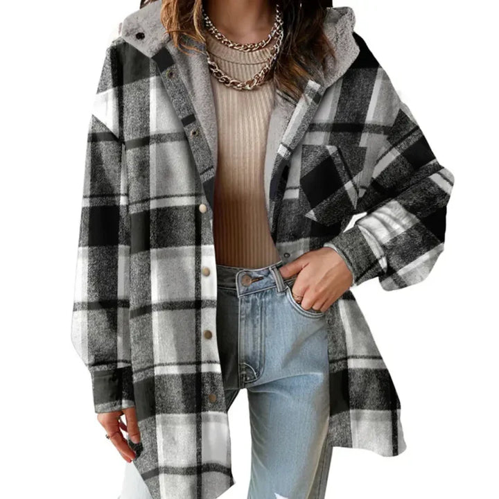 Oversized women's plaid hooded shacket, soft teddy bear lining, perfect for chilly weather.