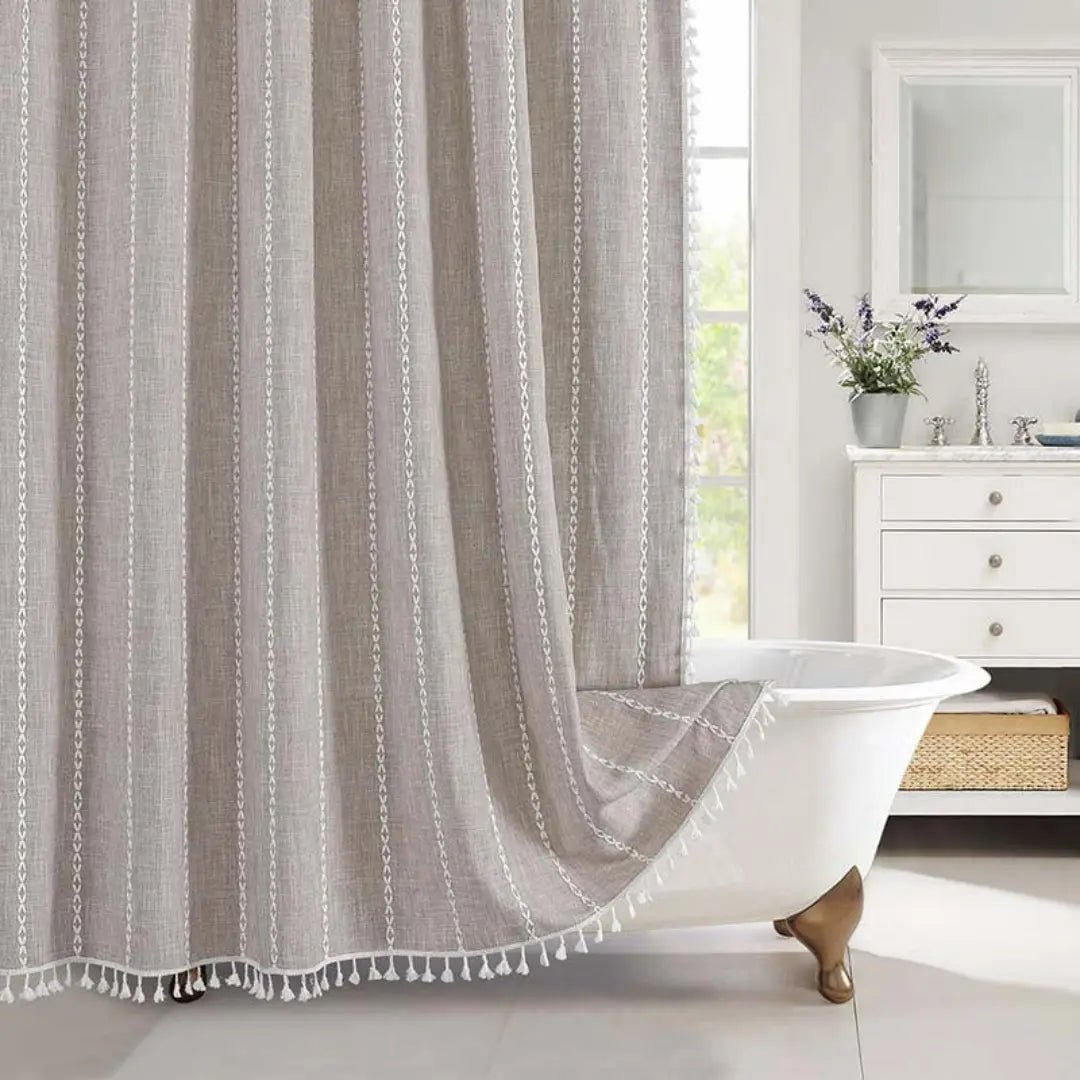 Boho chic linen shower curtain with tassels, perfect for a waterproof and stylish bathroom setting.