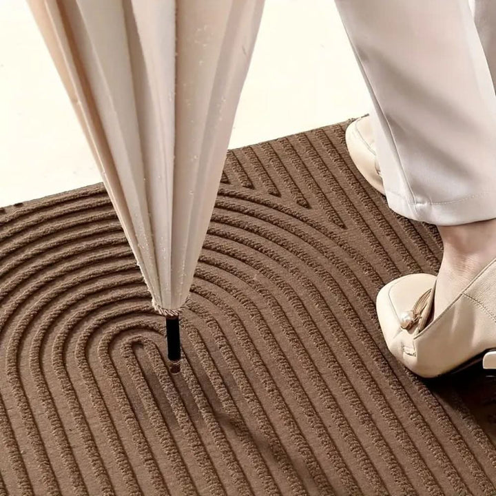 Durable washable floor mat, modern line pattern. Excellent absorbency for entryways, stylish utility mat.