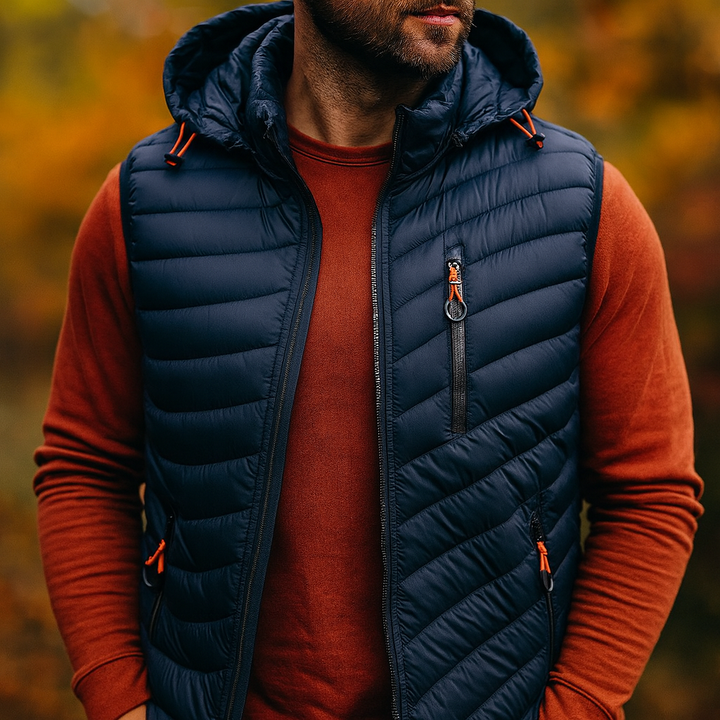 Lightweight, water-resistant men's sleeveless puffer vest with zip closure & detachable hood. (Blue)
