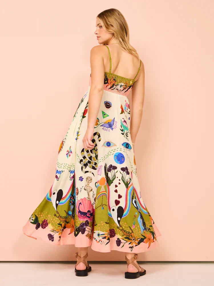 Close-up of a multicolor boho maxi dress fabric, showing flowy material & delicate spaghetti straps for summer.