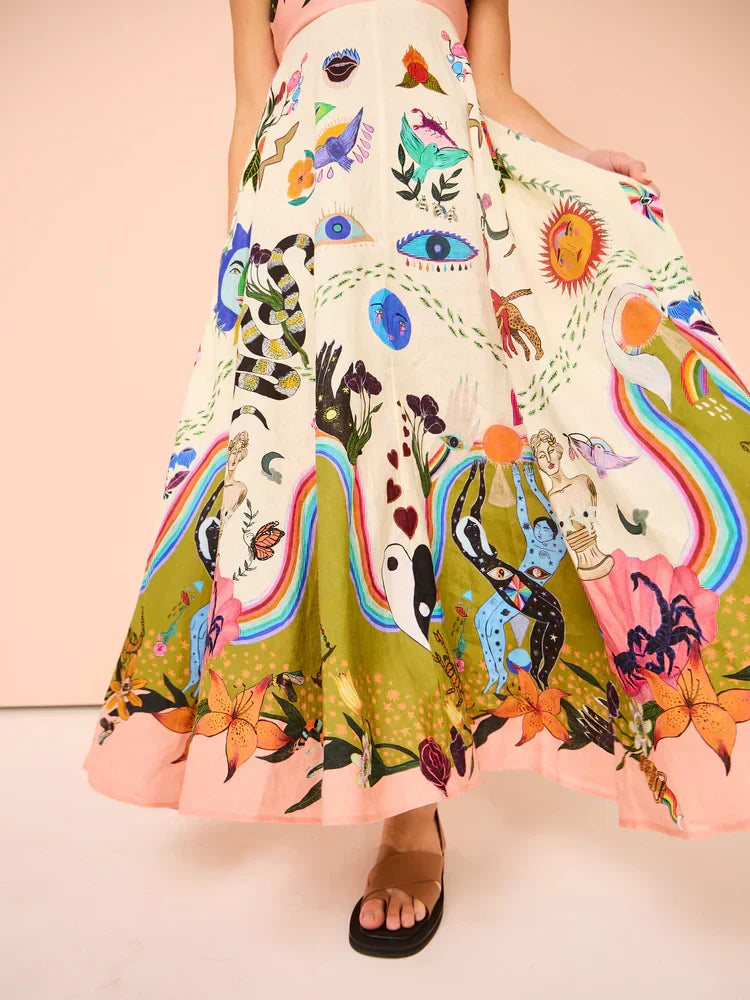 Multicolor women's boho maxi dress on a hanger, featuring flowy fabric & spaghetti straps, ready for summer fashion.