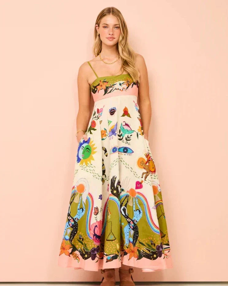 Women's flowing boho maxi sundress with spaghetti straps, perfect for summer beach vacations. Multicolor design.