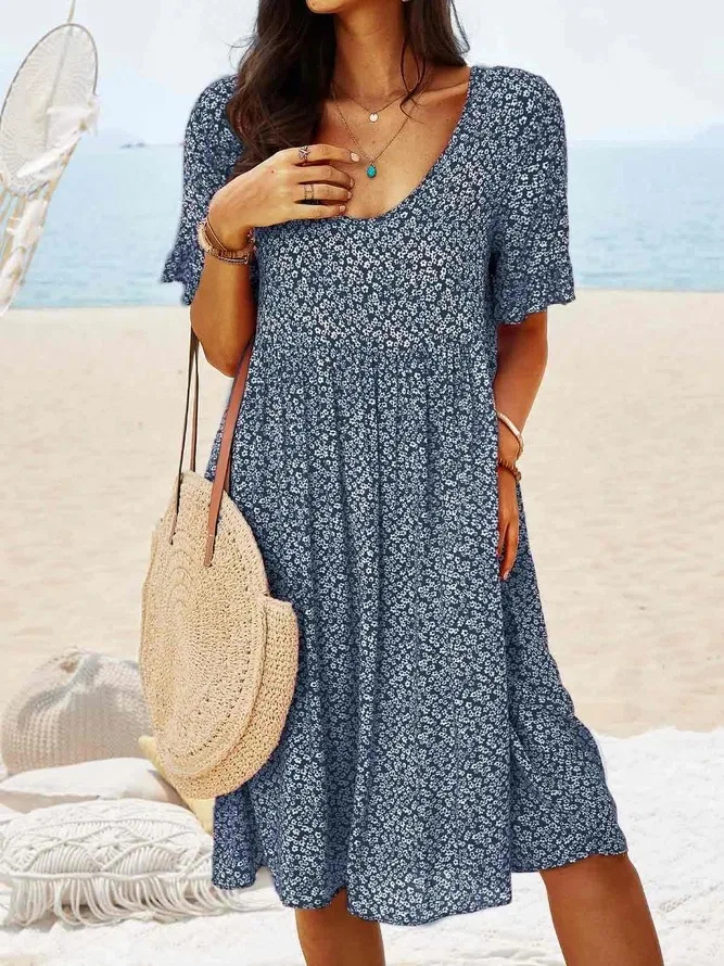 A-line women's mini dress featuring delicate flutter sleeves and a ditsy floral pattern.