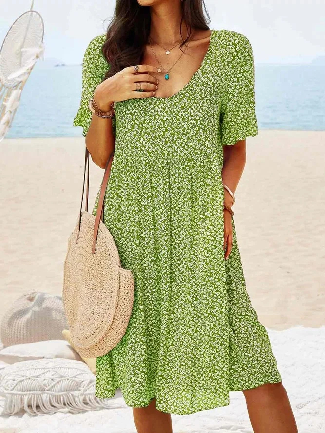 Casual A-line ditsy floral mini dress for women with flutter sleeves & a round neck. Summer essential.