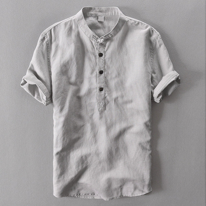 Breathable men's lightweight summer shirt. Short sleeve button-down design ensures ultimate comfort for warm weather wear.
