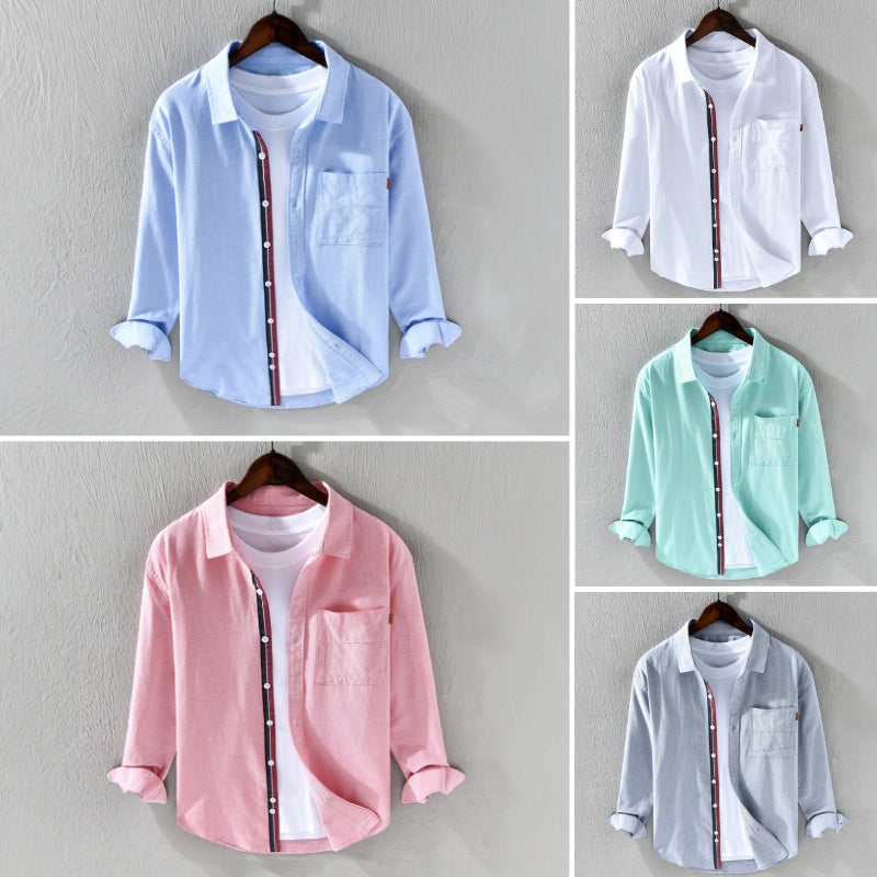 Men's blue oxford shirt. A stylish long sleeve button-down, perfect for versatile daily or office attire.