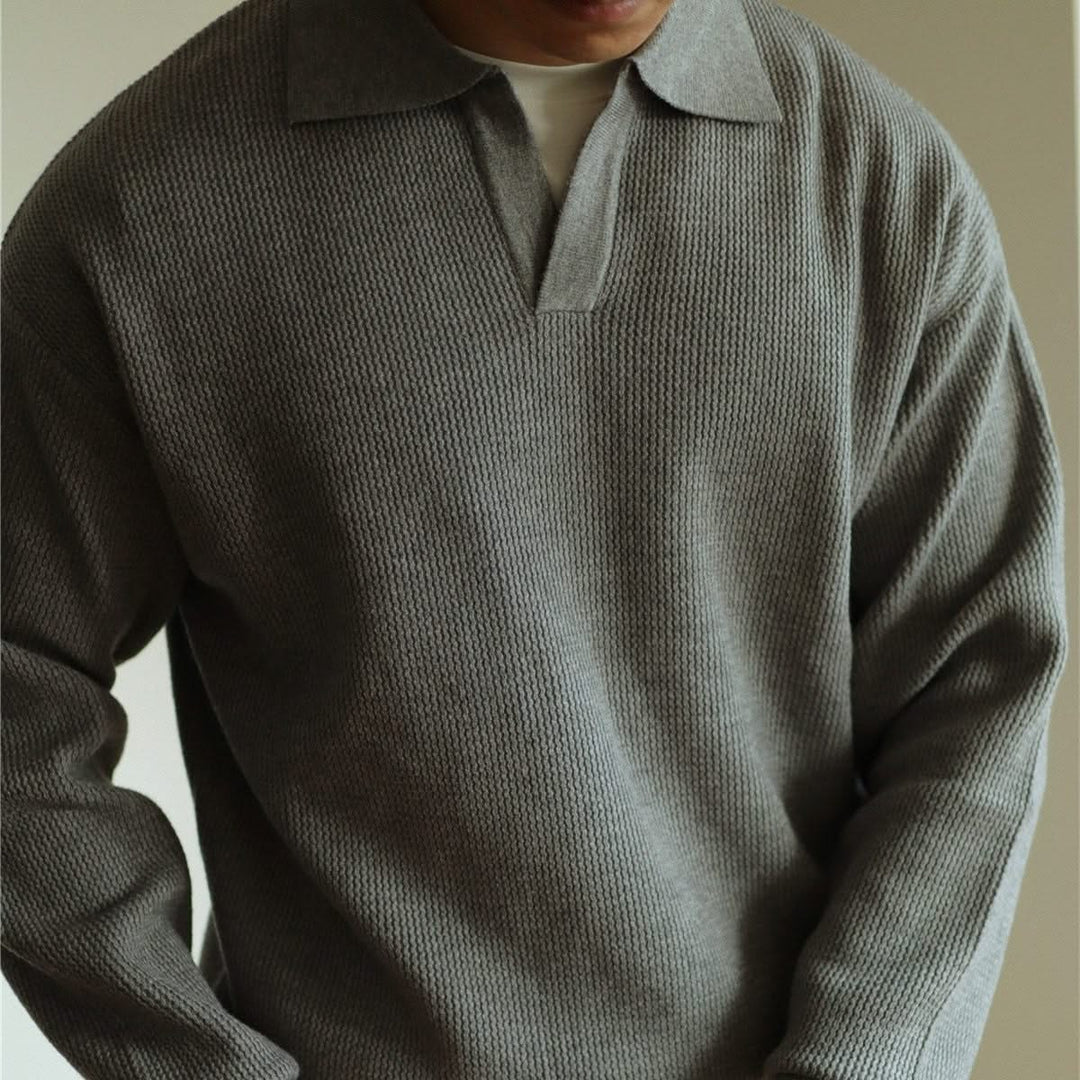 Cream men's knit polo shirt, comfortable & soft. Breathable fabric and classic fit for versatile men's fashion.