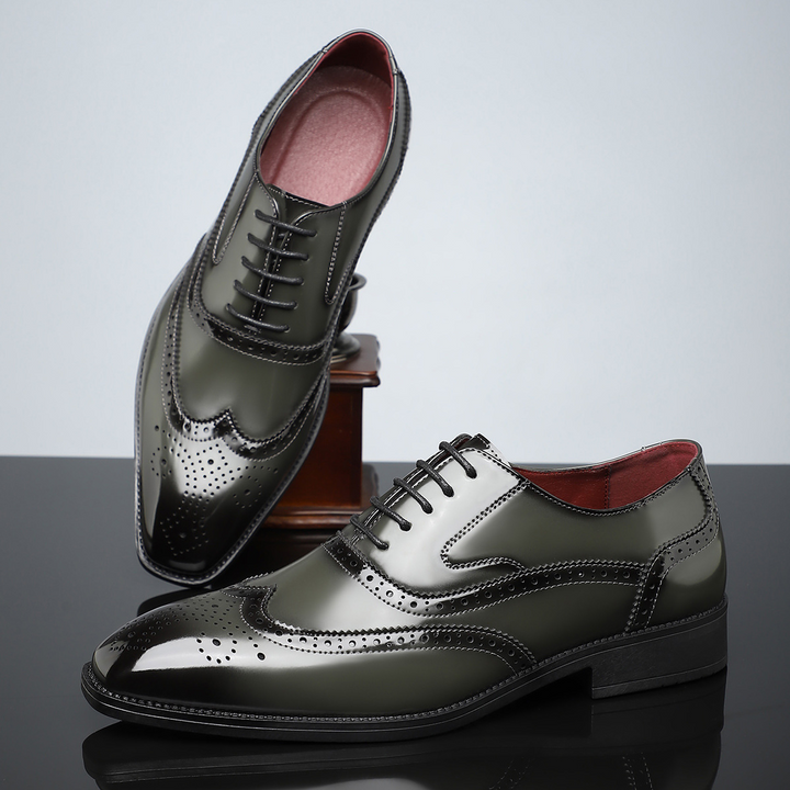 Comfortable men's brogue wingtip shoes in a classic brown finish, ideal for all-day office wear.