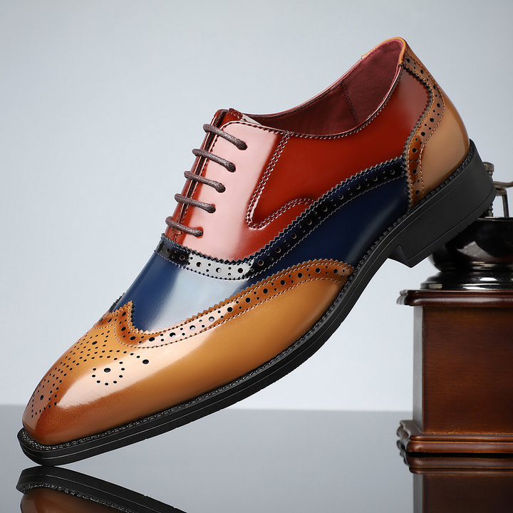 Men's classic brown leather brogue wingtip dress shoes for formal office wear & business attire.