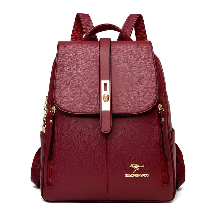 Modern women's black PU leather backpack, a fashionable & functional office handbag.