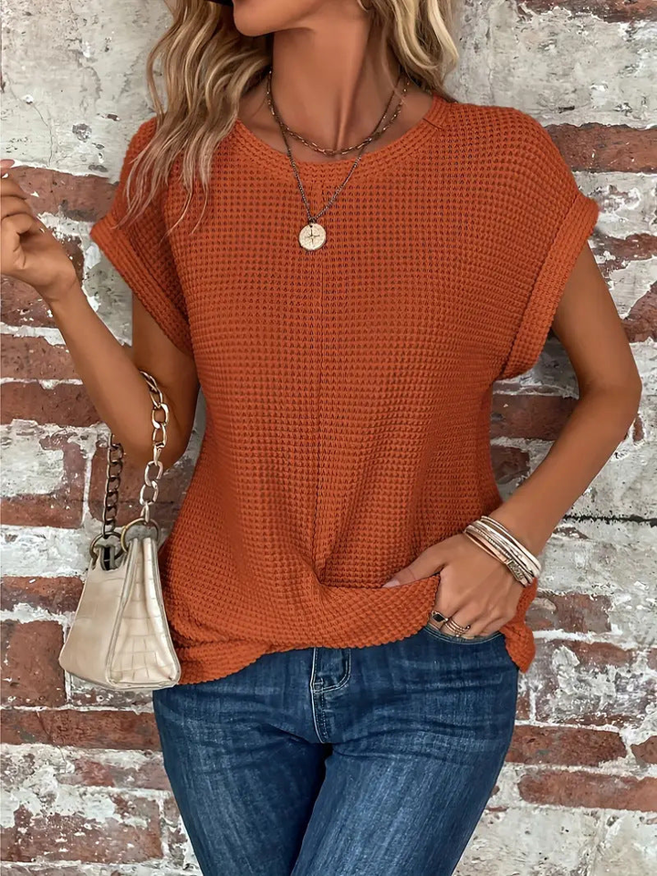Versatile women's short sleeve waffle knit top, perfect for spring, summer, and autumn layering.