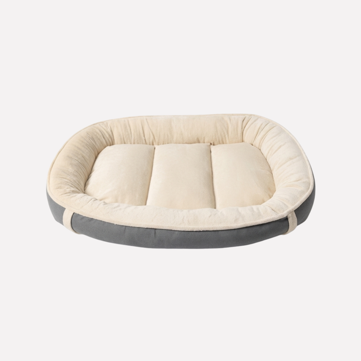 Soft, washable pet nest bed for dogs. Plush design ensures cozy comfort & easy cleaning for your furry friend.