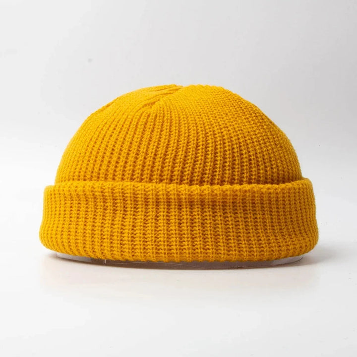 Unisex winter knit beanie, a cozy casual skull cap ideal for cold weather outings.