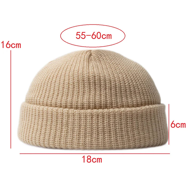 Warm unisex winter beanie, snug knit skull cap protects from cold, essential accessory.