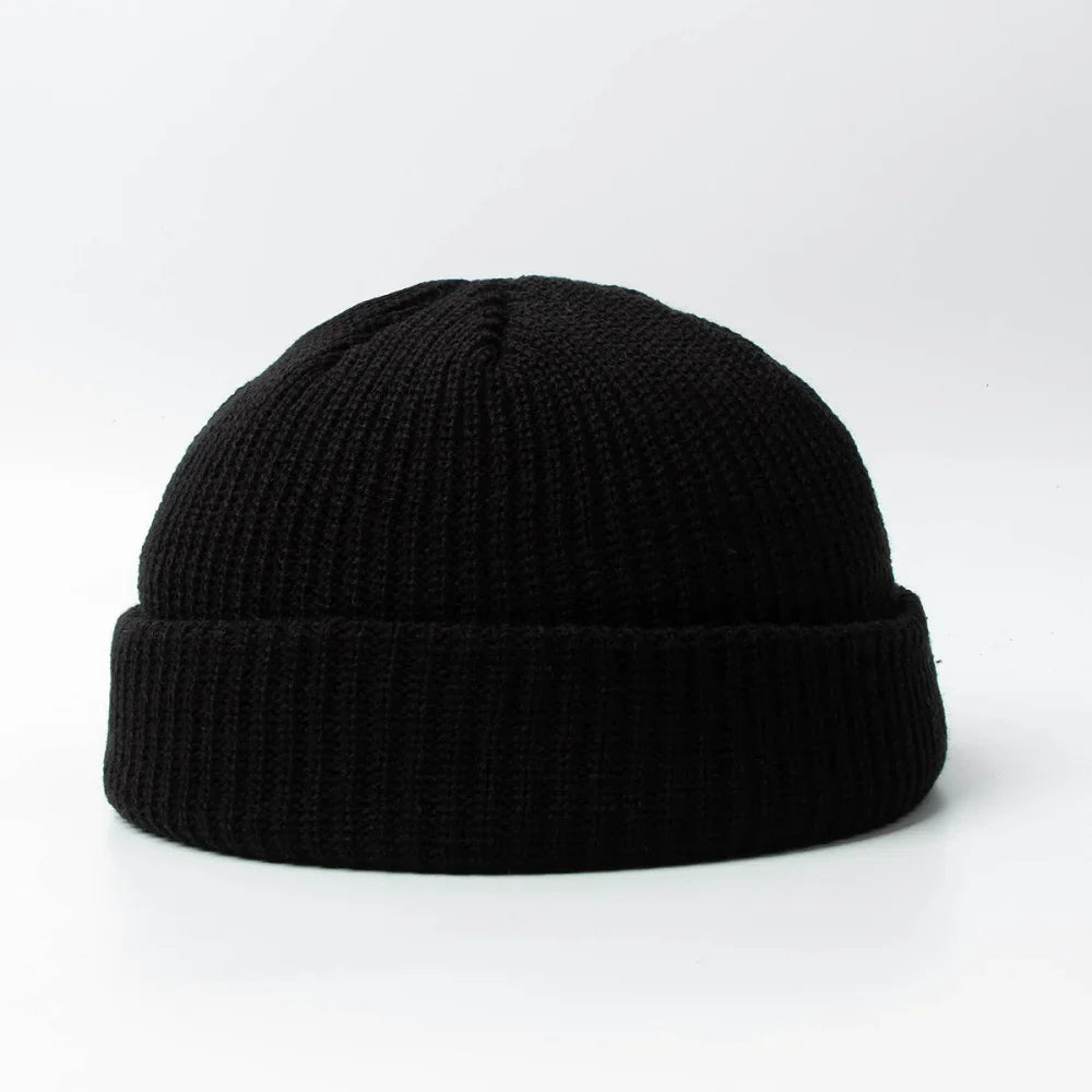 Heather grey cotton blend unisex winter knit beanie, warm skull cap for casual outfits.