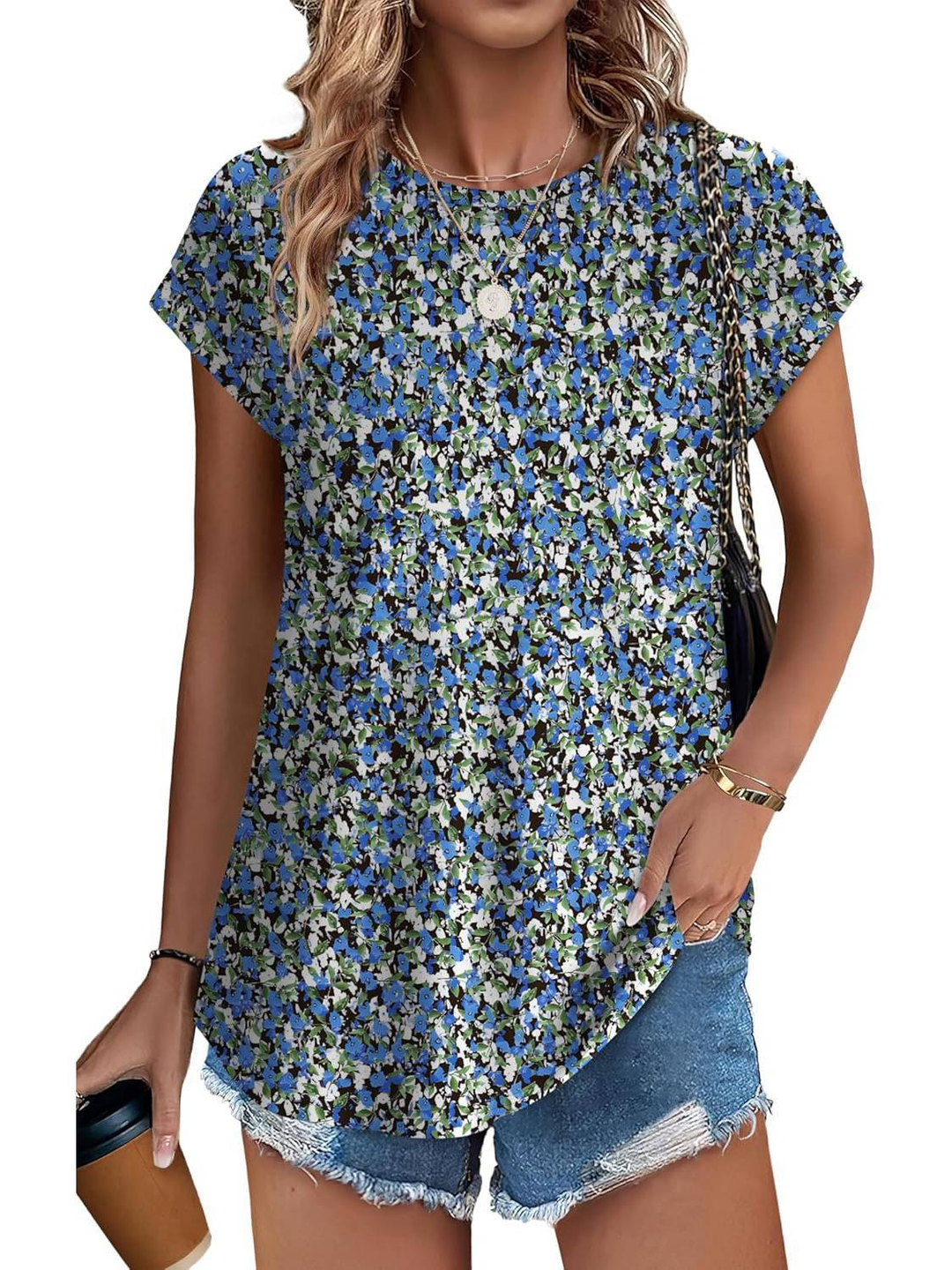 Women's casual top with green botanical leaf print and comfortable cap sleeves.