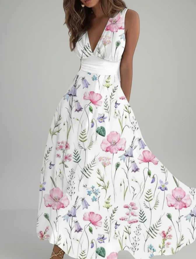Effortless women's midi dress in a breezy floral print with a stylish V-neck & flowy A-line silhouette.