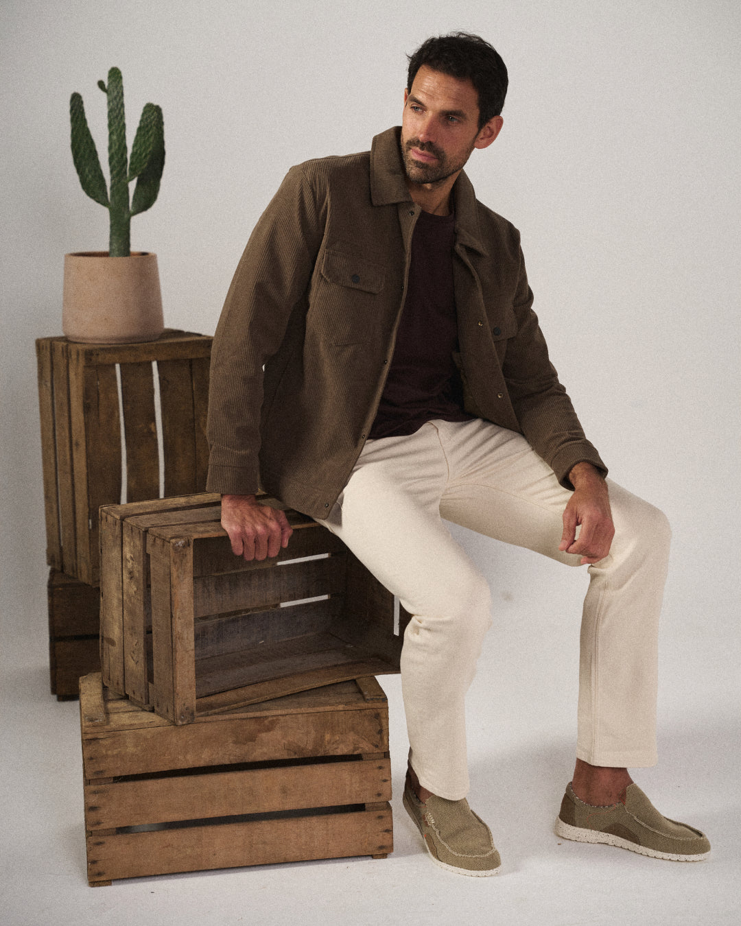 Side view of men's blue Dockstone slip-on canvas loafers, casual & comfortable walking shoes for easy wear.