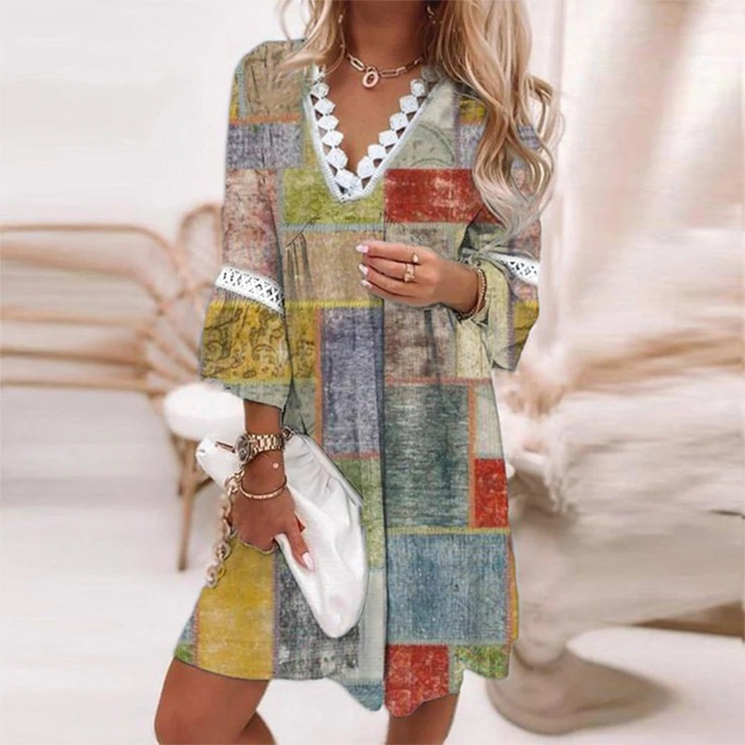 Casual women's boho summer dress with a comfortable V-neck design. Light & breezy for vacation or everyday wear.