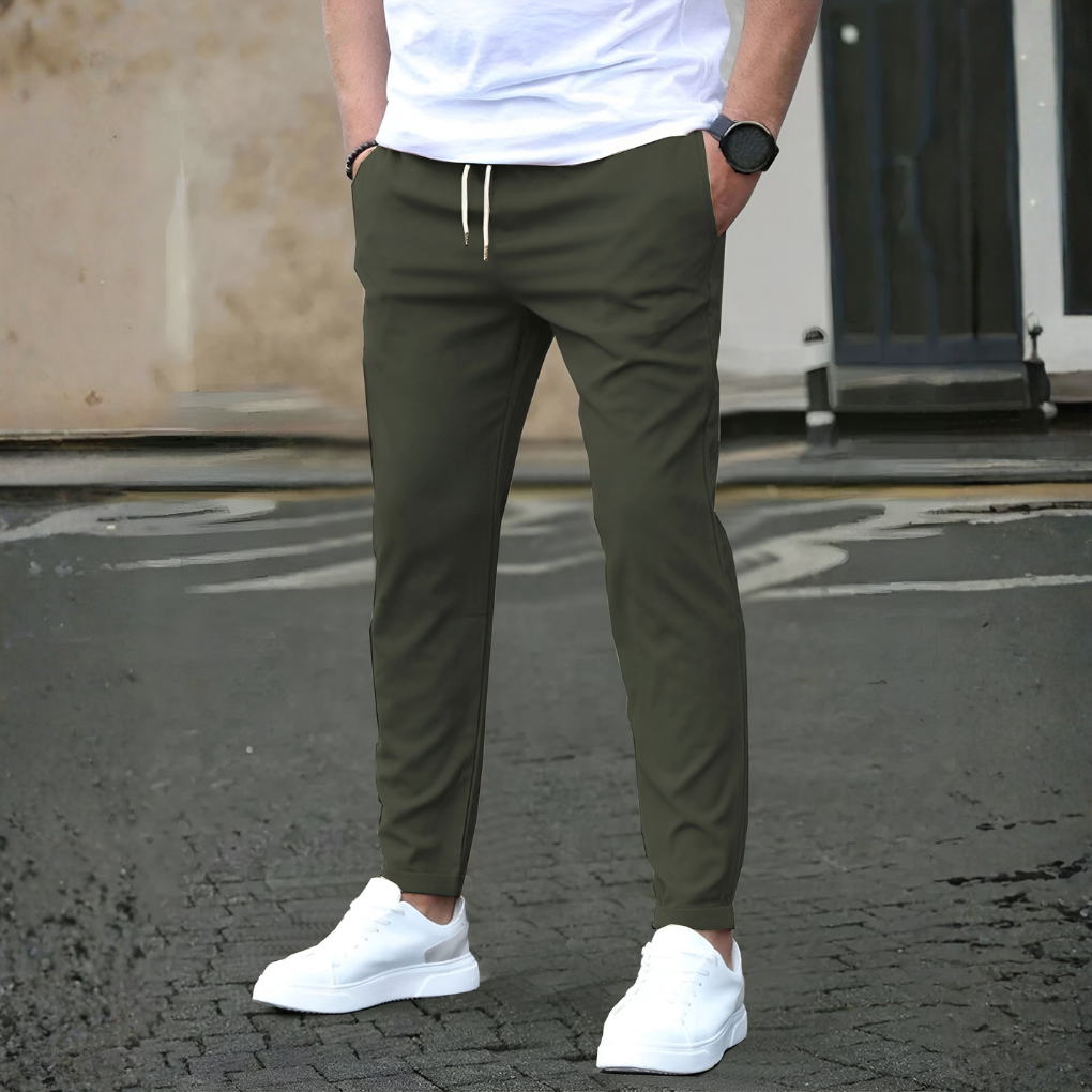 Modern men's slim fit drawstring trousers, perfect for versatile athleisure, casual, or travel fashion.