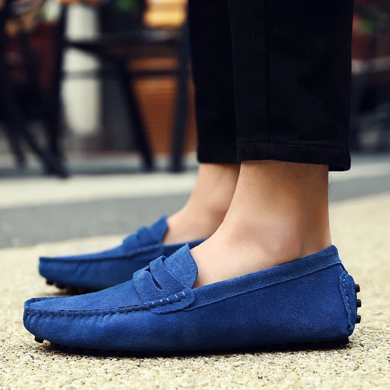 Brown Men's Maverick slip-on loafers. Classic men's dress shoes, formal footwear.