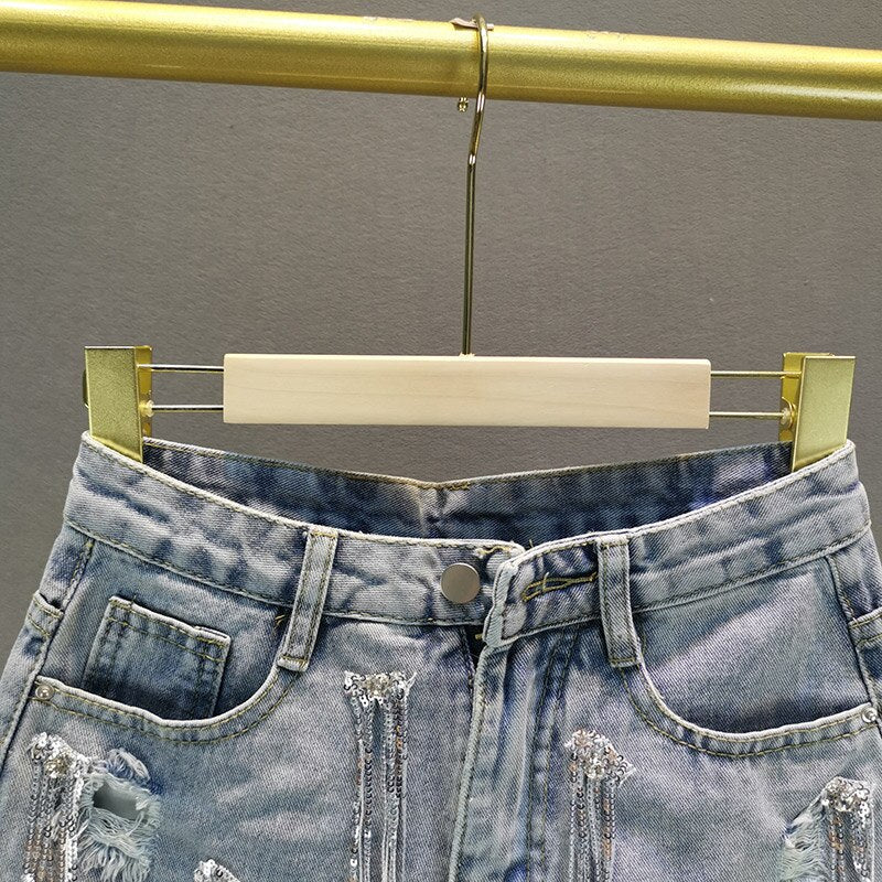 Comfortable blue high-waisted women's shorts, a stylish versatile bottom for everyday summer fashion.