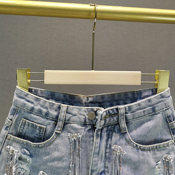 Comfortable blue high-waisted women's shorts, a stylish versatile bottom for everyday summer fashion.