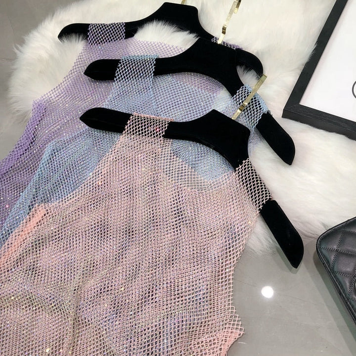 Elegant women's dazzling tank top with shimmering details. Perfect for chic party wear & evening occasions.
