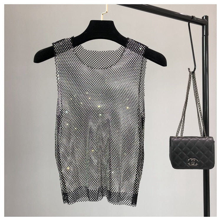 Chic women's sleeveless party top with dazzling sparkle. Ideal for glamorous evening wear & summer nights.