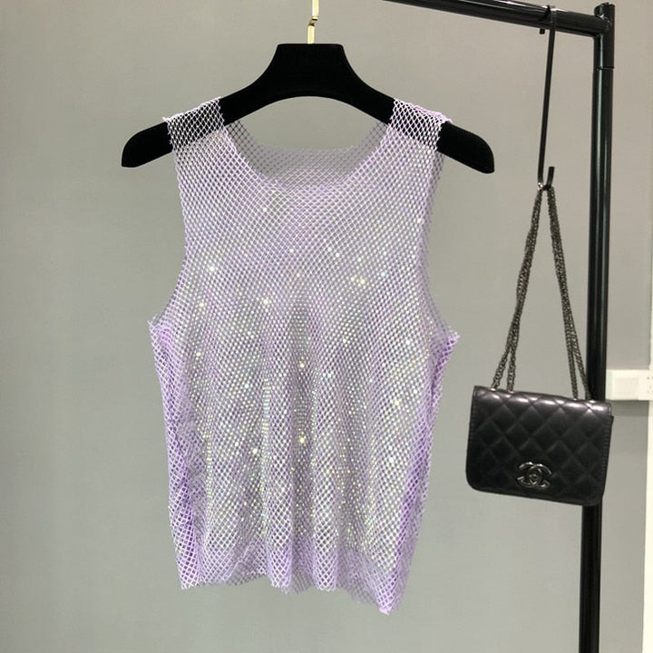 Sleeveless women's sparkling party top. Chic dazzling design for glamorous evening wear & summer fashion.