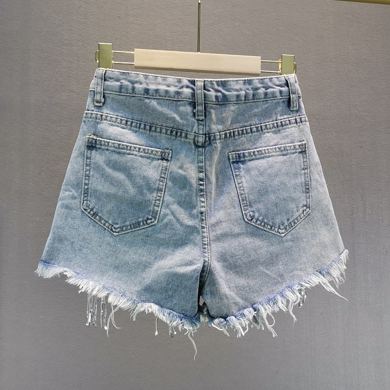 Women's high-waisted everyday shorts in blue, offering versatile comfort for casual summer fashion.
