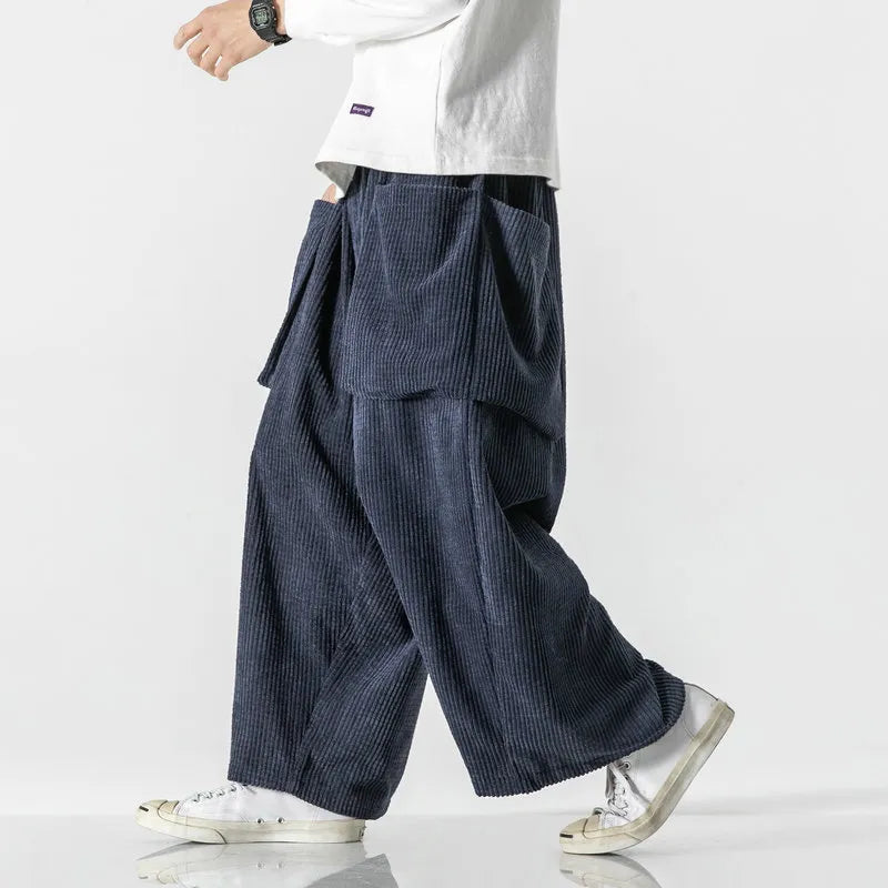 Unisex relaxed fit grey sweatpants for effortless comfort & casual style. Ideal for lounging or street wear.