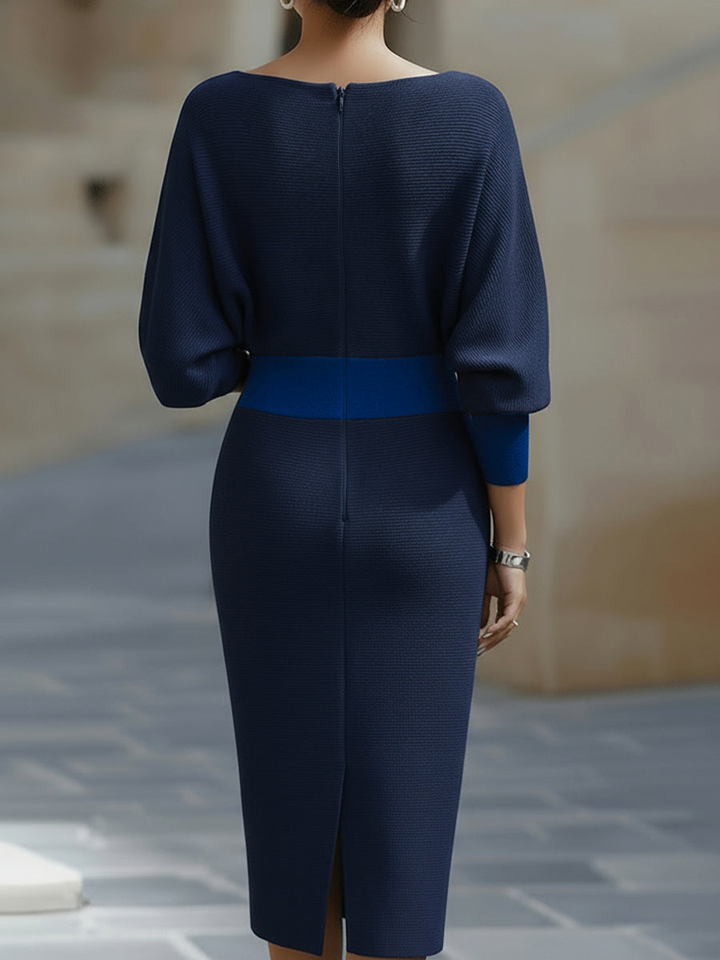 Modern sophisticated women's cowl-neck bodycon midi dress, ideal for elegant evening fashion and events.