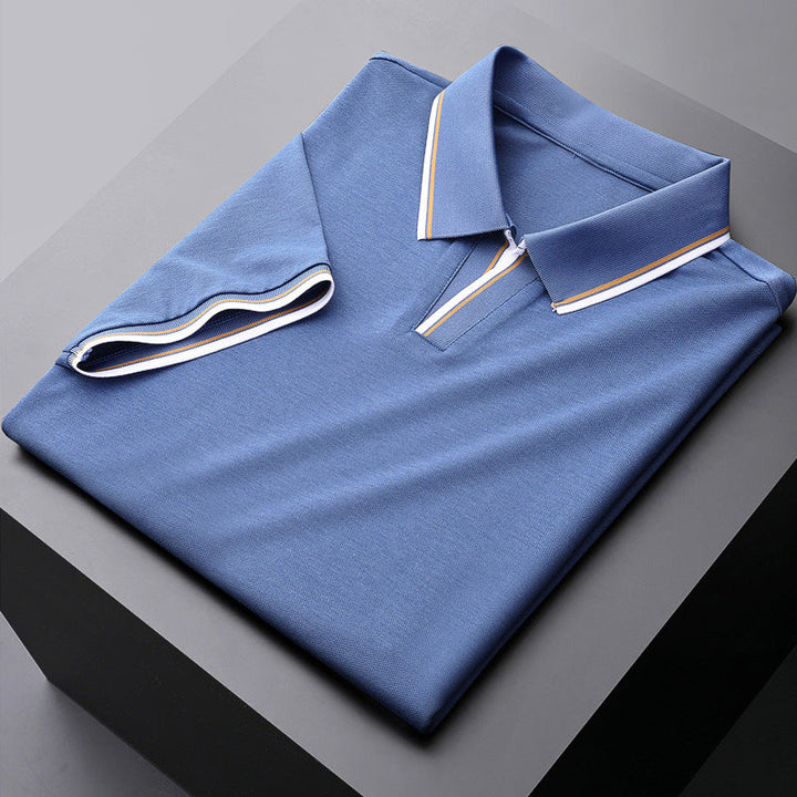 Versatile men's polo shirt, perfect for casual or semi-formal occasions. Stylish short sleeve, classic design.