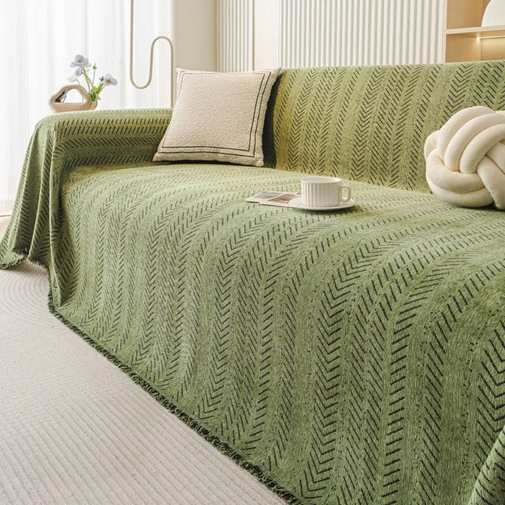 Elegant chenille sofa slipcover enhancing living room decor while offering scratch-resistant, washable protection. Home accessory.