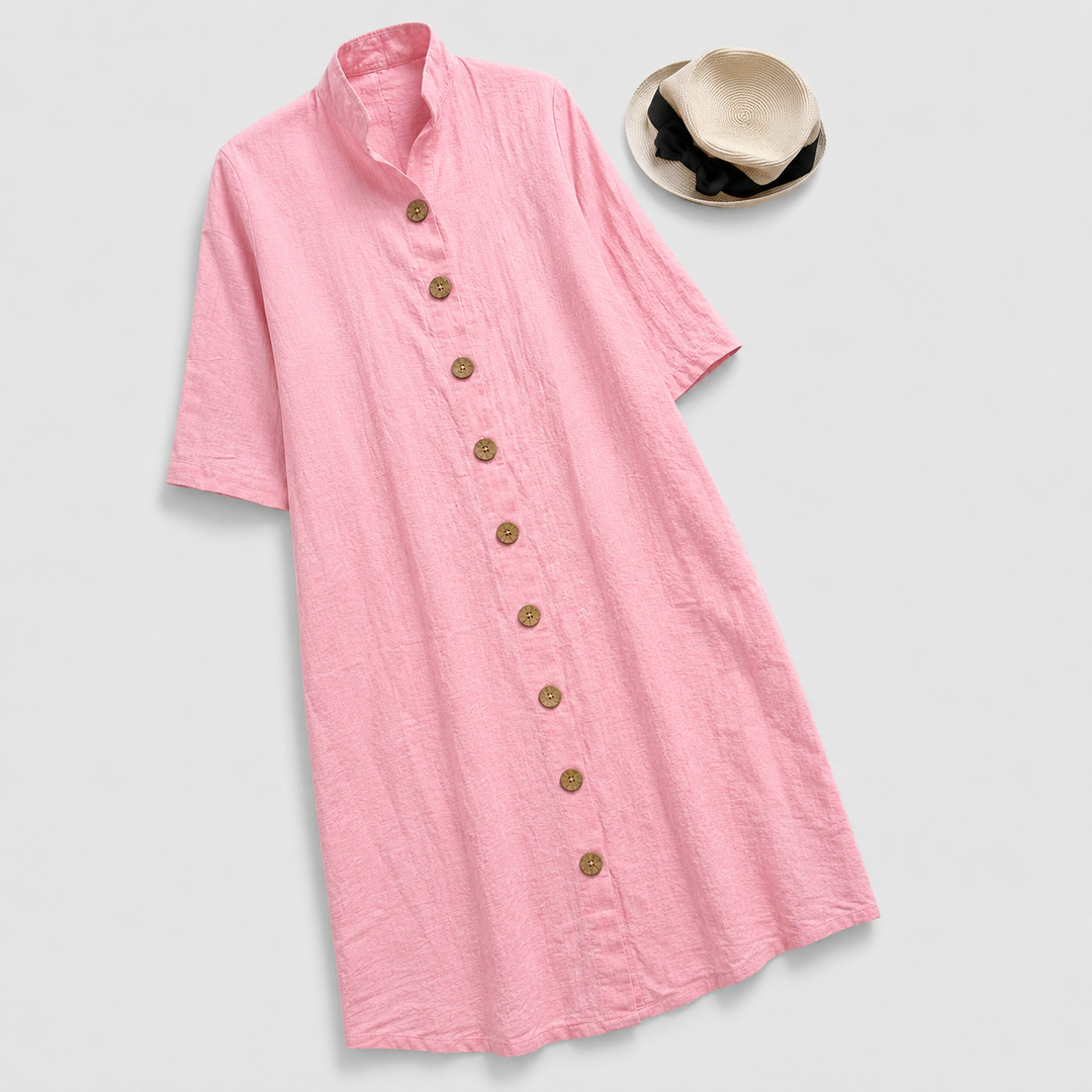 Chic women's long sleeve button-down shirt dress, featuring a stylish layered hem, ideal for spring or fall fashion.