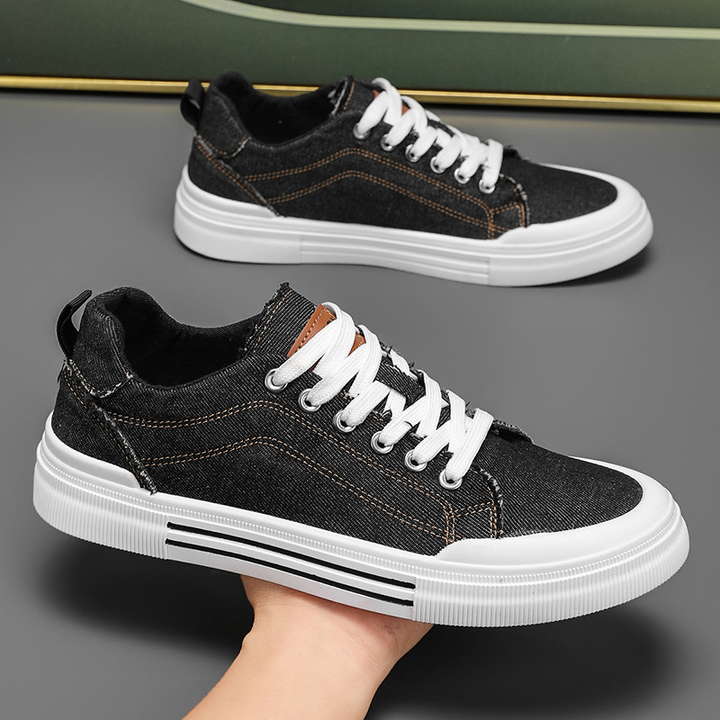 Black urban style men's sneakers, comfortable walking shoes for daily errands.