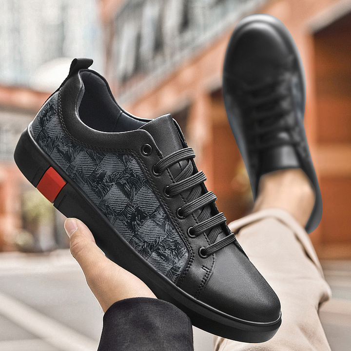 Textured material close-up of men's fashion sneakers, emphasizing quality & streetwear appeal.