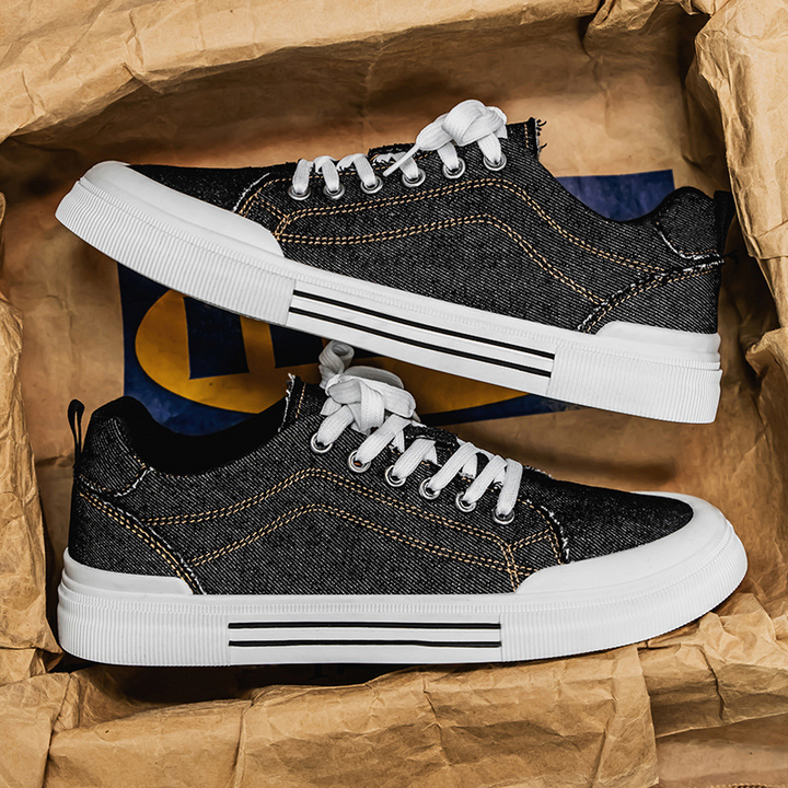 Stylish blue men's sneakers, durable low-top footwear for comfortable urban adventures.