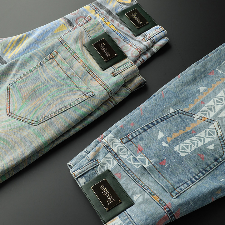 Trendy unisex patterned denim jeans with tribal-inspired patterns, ideal for a unique and casual fashion style.