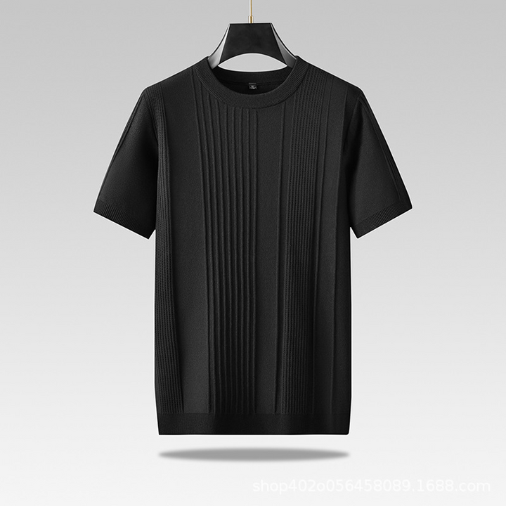 Detail of the textured knit fabric on a men's lightweight crew neck tee, soft and breathable.