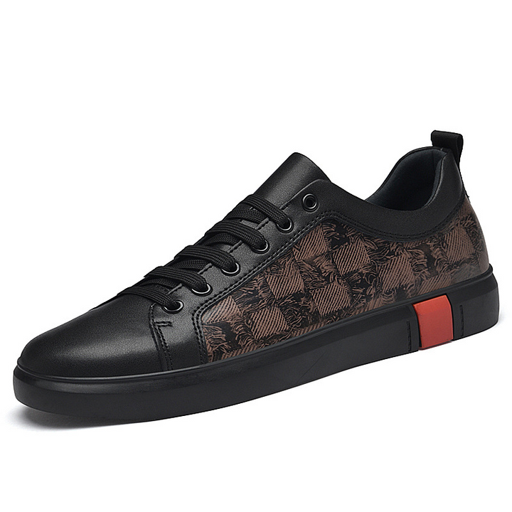 Sole detail of men's signature footwear, offering excellent grip and cushioned support.
